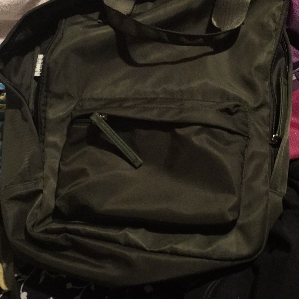 An Army Green Backpack still in great condition